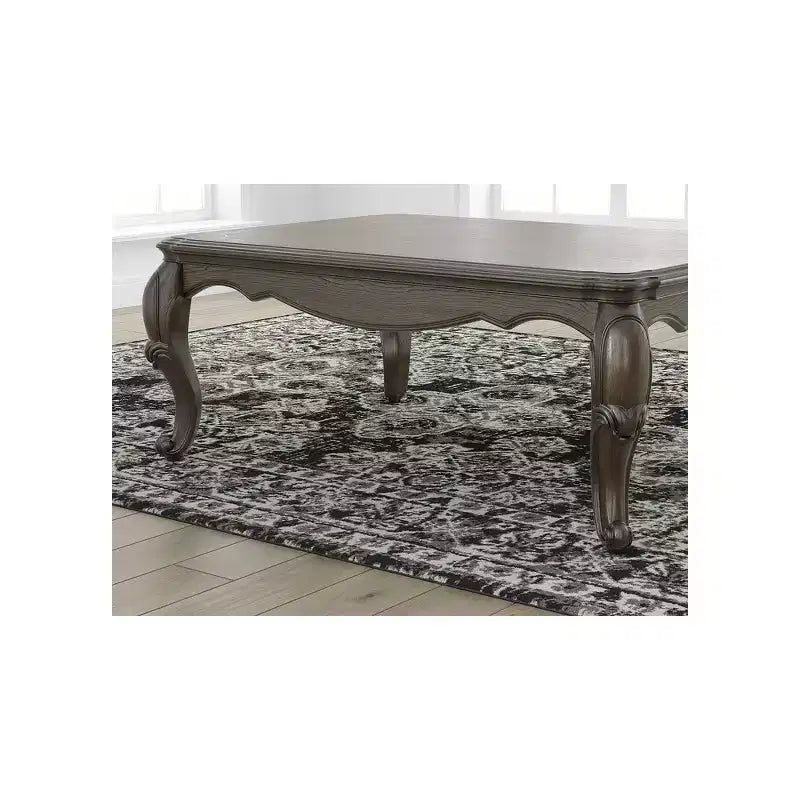 Signature Design by Ashley Maylee Coffee Table with Dark Brown Finish and Cabriole Legs