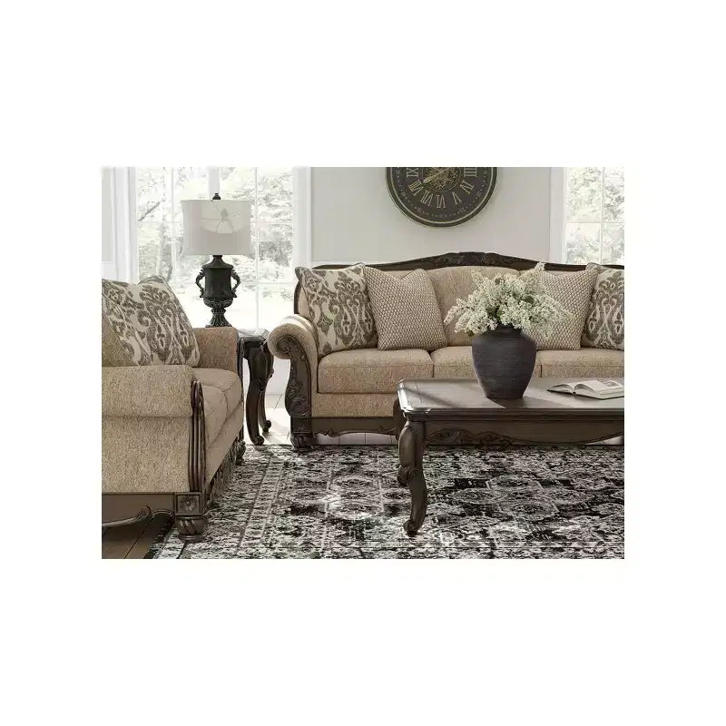 Signature Design by Ashley Maylee Coffee Table with Dark Brown Finish and Cabriole Legs